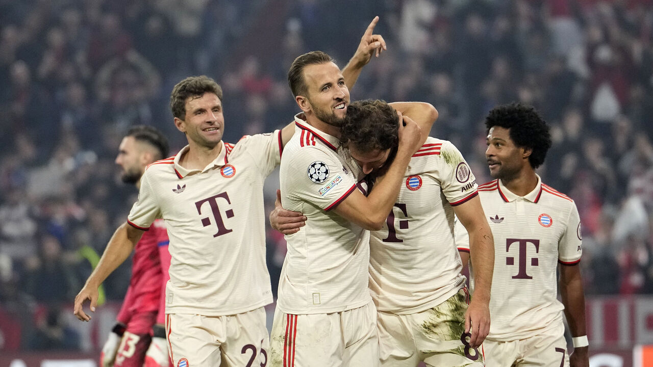 MUNICH, GERMANY - SEPTEMBER 17: Leon Goretzka of Bayern Munich celebrates scoring his team's ninth goal with teammate Harry Kane during the UEFA Champions League 2024/25 League Phase MD1 match between FC Bayern München and GNK Dinamo at Football Arena Munich on September 17, 2024 in Munich, Germany.