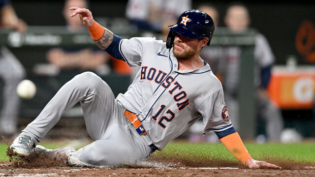 BALTIMORE, MARYLAND - AUGUST 25: Ben Gamel #12 of the Houston Astros scores in the eighth inning against the Baltimore Orioles at Oriole Park at Camden Yards on August 25, 2024 in Baltimore, Maryland.