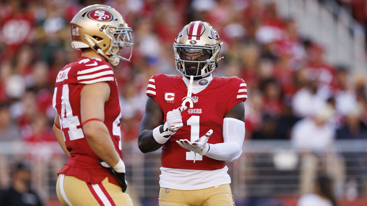 SANTA CLARA, CA - SEPTEMBER 9: Fullback Kyle Juszczyk #44 of the San Francisco 49ers and wide receiver Deebo Samuel Sr. #1 stand on the field before a kickoff during the first quarter of an NFL football game against the New York Jets, at Levi's Stadium on September 9, 2024 in Santa Clara, California.
