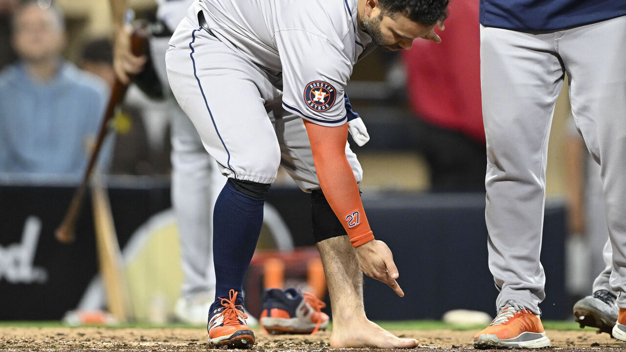 SAN DIEGO, CA - SEPTEMBER 17: Jose Altuve #27 of the Houston Astros points to his foot after grounding out during the ninth inning of a baseball game against the San Diego Padres at Petco Park on September 17, 2024 in San Diego, California.