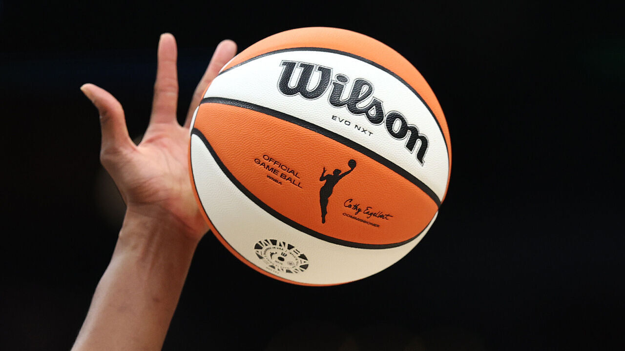 SEATTLE, WASHINGTON - JULY 10: The WNBA logo on the ball is seen as it is tipped during the game between the Seattle Storm and the Las Vegas Aces at Climate Pledge Arena on July 10, 2024 in Seattle, Washington.