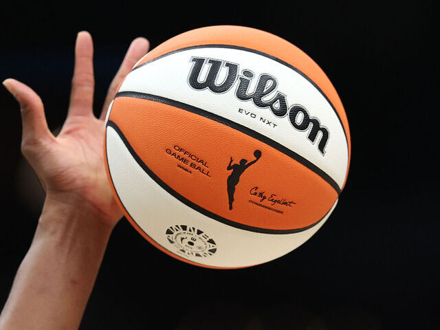 SEATTLE, WASHINGTON - JULY 10: The WNBA logo on the ball is seen as it is tipped during the game between the Seattle Storm and the Las Vegas Aces at Climate Pledge Arena on July 10, 2024 in Seattle, Washington.