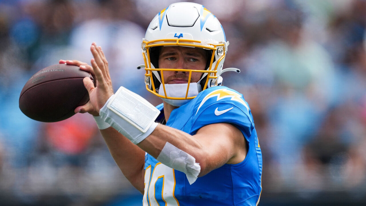 CHARLOTTE, NORTH CAROLINA - SEPTEMBER 15: Justin Herbert #10 of the Los Angeles Chargers looks to pass against the Carolina Panthers during the game at Bank of America Stadium on September 15, 2024 in Charlotte, North Carolina.