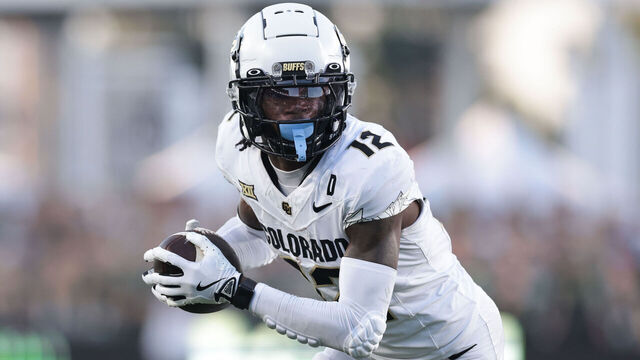 FORT COLLINS, COLORADO - SEPTEMBER 14: Travis Hunter #12 of the Colorado Buffaloes runs with the ball during the second quarter against the Colorado State Rams at Canvas Stadium on September 14, 2024 in Fort Collins, Colorado.