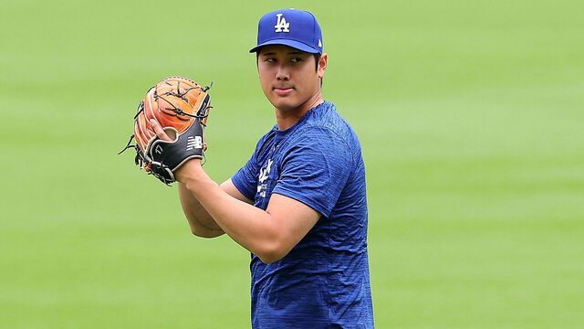 ATLANTA, GEORGIA - SEPTEMBER 14: Shohei Ohtani #17 of the Los Angeles Dodgers warms up pitching in the outfield prior to facing the Atlanta Braves at Truist Park on September 14, 2024 in Atlanta, Georgia.