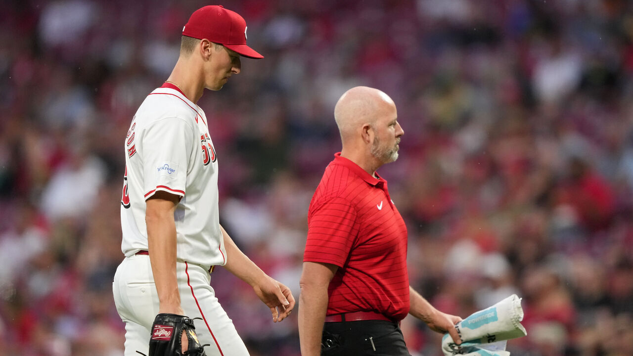 CINCINNATI, OHIO - SEPTEMBER 17: Brandon Williamson #55 of the Cincinnati Reds walks off the field after being injured in the second inning against the Atlanta Braves at Great American Ball Park on September 17, 2024 in Cincinnati, Ohio.