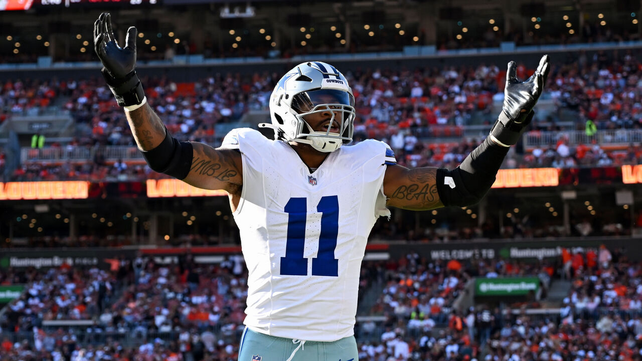 CLEVELAND, OHIO - SEPTEMBER 08: Micah Parsons #11 of the Dallas Cowboys celebrates an interception by Eric Kendricks during the second quarter against the Cleveland Browns at Huntington Bank Field on September 08, 2024 in Cleveland, Ohio.