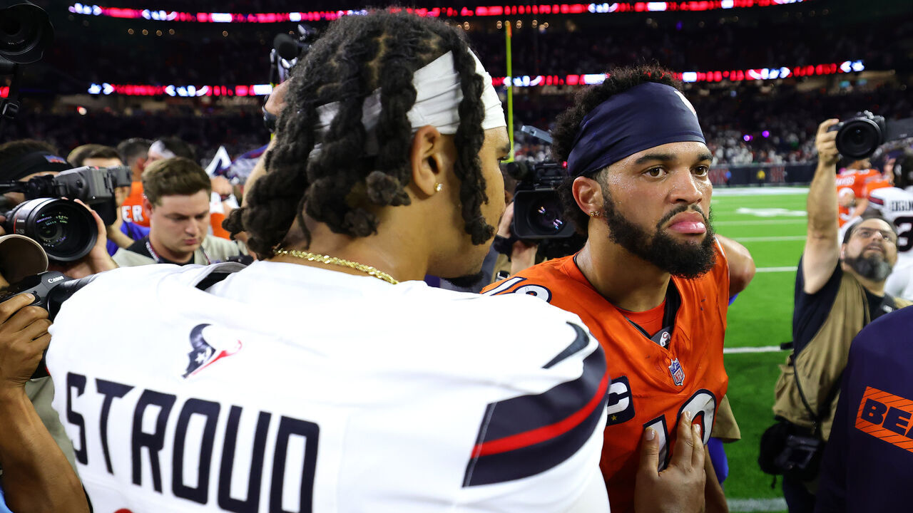 HOUSTON, TEXAS - SEPTEMBER 15: C.J. Stroud #7 of the Houston Texans shakes hands with Caleb Williams #18 of the Chicago Bears following the game at NRG Stadium on September 15, 2024 in Houston, Texas.