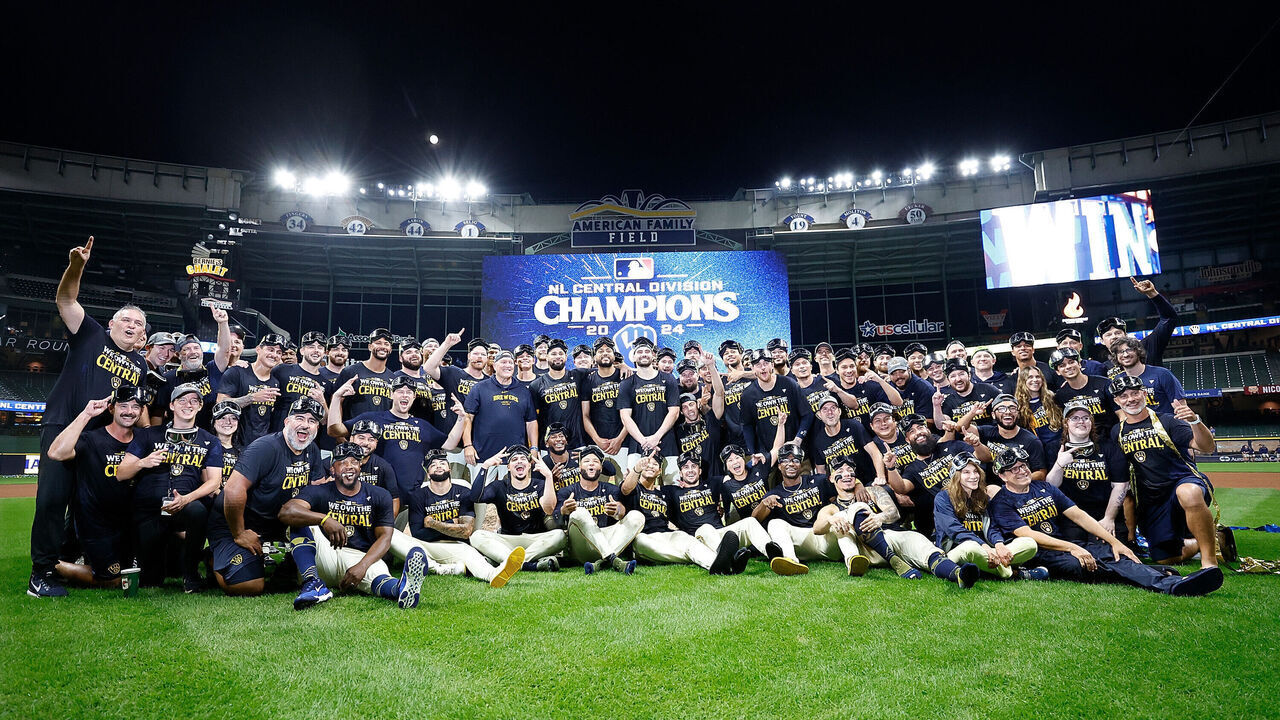 MILWAUKEE, WISCONSIN - SEPTEMBER 18: The Milwaukee Brewers take a team photo after winning the NL Central Division at American Family Field on September 18, 2024 in Milwaukee, Wisconsin.