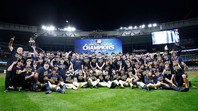 MILWAUKEE, WISCONSIN - SEPTEMBER 18: The Milwaukee Brewers take a team photo after winning the NL Central Division at American Family Field on September 18, 2024 in Milwaukee, Wisconsin.