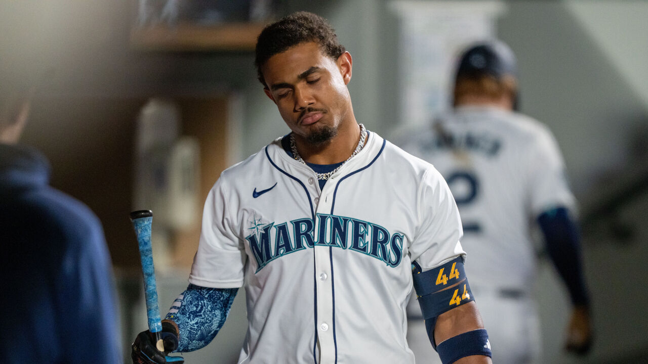 SEATTLE, WA - SEPTEMBER 18: Julio Rodriguez #44 of the Seattle Mariners reacts in the dugout after striking out during the fifth inning of a game against the New York Yankees at T-Mobile Park on September 18, 2024 in Seattle, Washington.