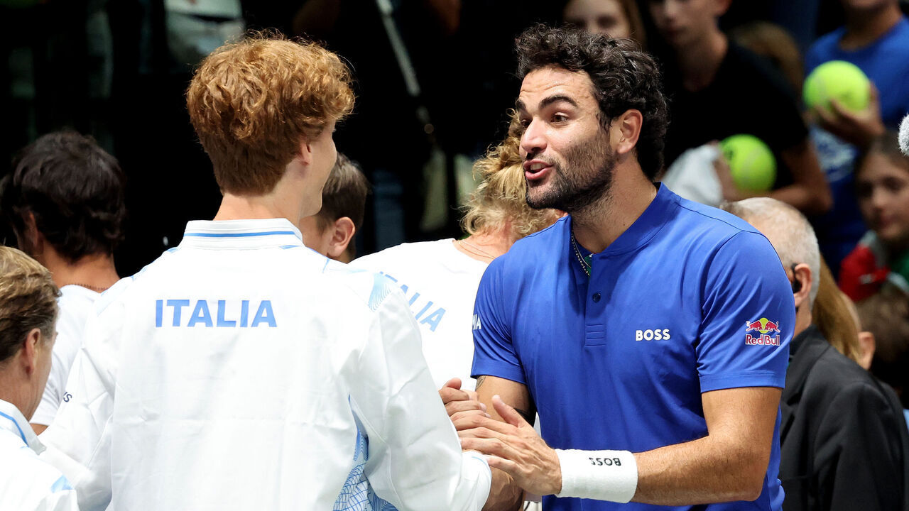 BOLOGNA, ITALY - SEPTEMBER 15: Matteo Berrettini of Italy celebrates with Jannik Sinner after winning the 2024 Davis Cup Finals Group Stage match against Netherlands at Unipol Arena on September 15, 2024 in Bologna, Italy.