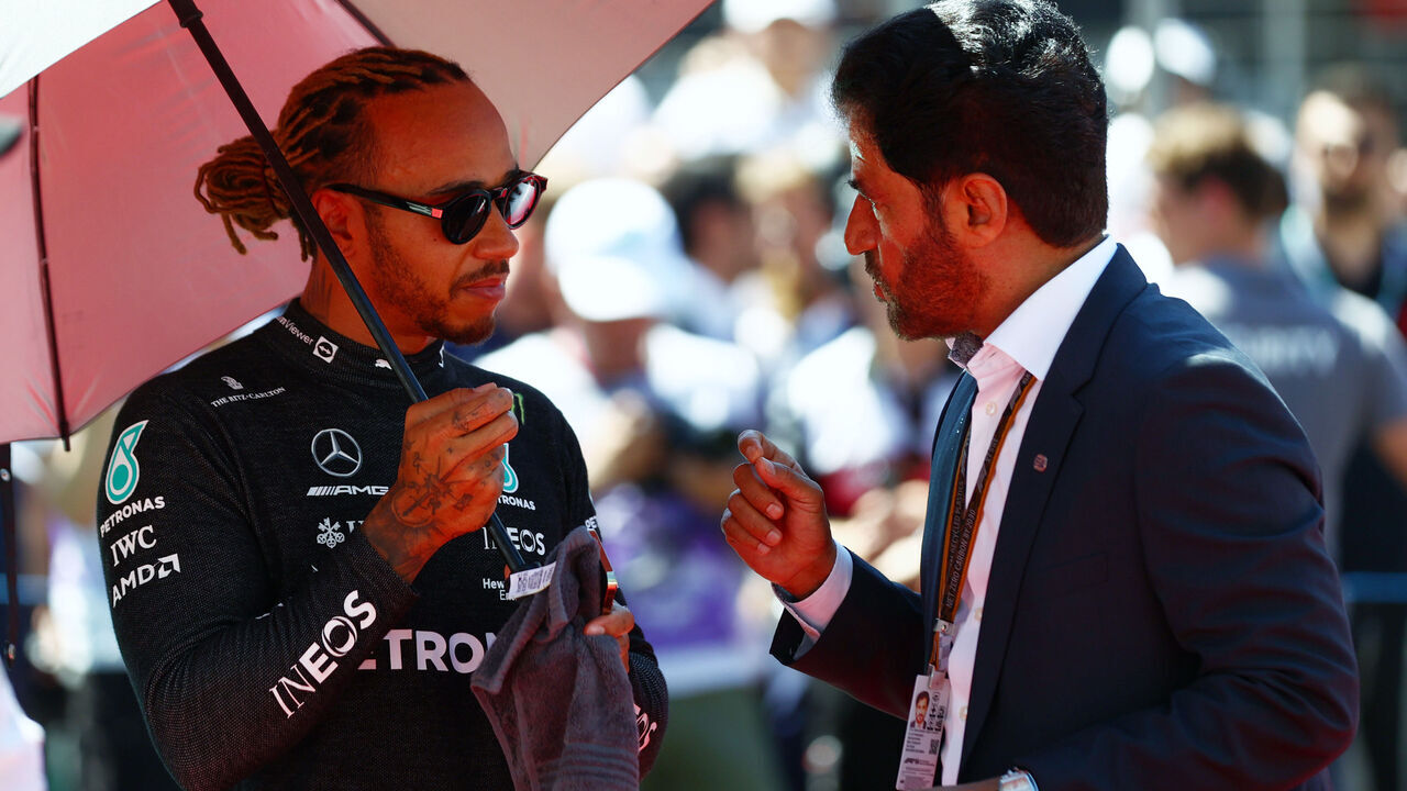 BAKU, AZERBAIJAN - JUNE 12: Lewis Hamilton of Great Britain and Mercedes speaks with Mohammed ben Sulayem, FIA President, on the grid before the F1 Grand Prix of Azerbaijan at Baku City Circuit on June 12, 2022 in Baku, Azerbaijan.