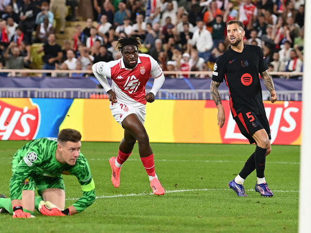 MONACO, MONACO - SEPTEMBER 19: George Ilenikhena of AS Monaco celebrates 2nd goal during the UEFA Champions League 2024/25 League Phase MD1 match between AS Monaco and FC Barcelona at Stade Louis II on September 19, 2024 in Monaco, Monaco.