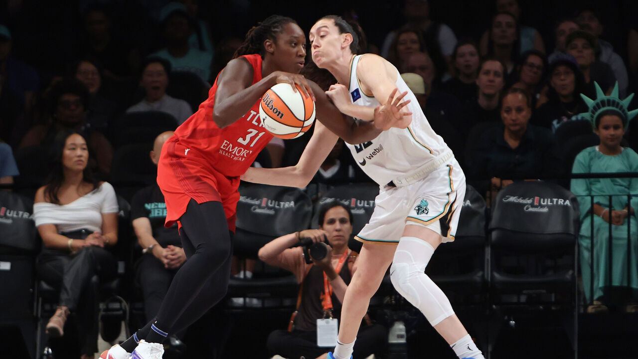 NEW YORK, NEW YORK - SEPTEMBER 19: Breanna Stewart #30 of the New York Liberty guards Tina Charles #31 of the Atlanta Dream during the second quarter at Barclays Center on September 19, 2024 in the Brooklyn borough of New York City.