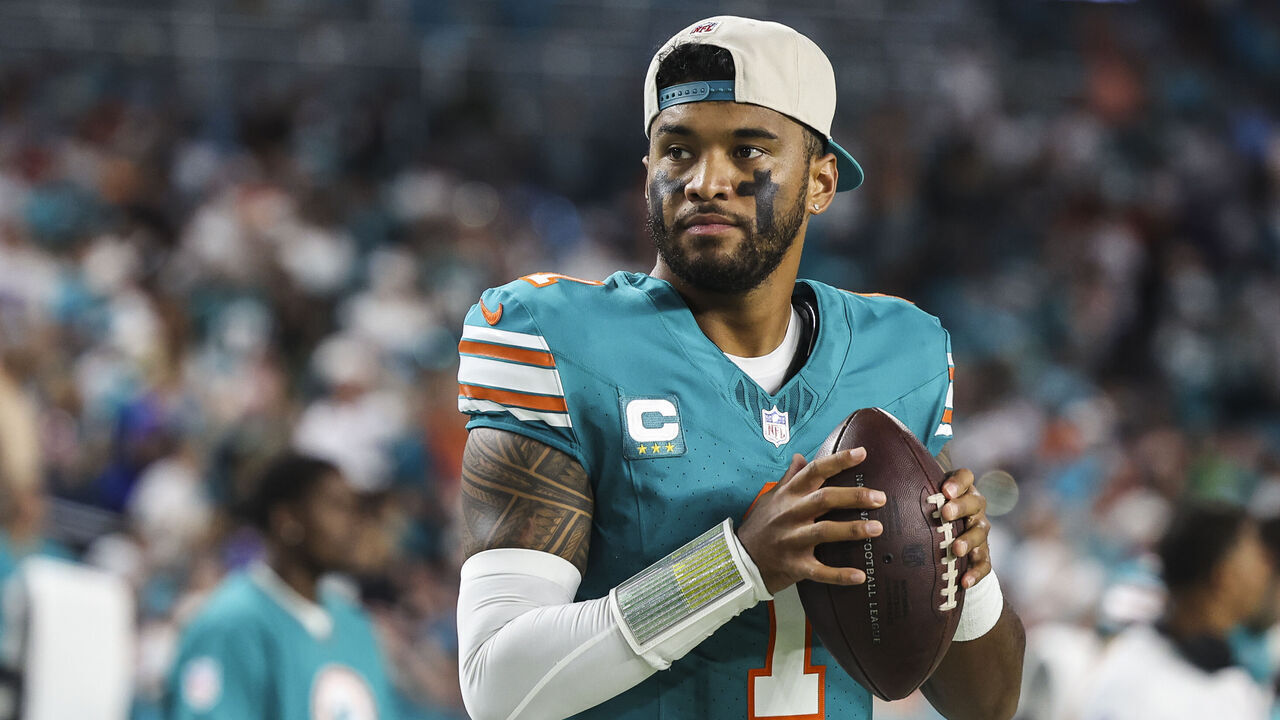 MIAMI GARDENS, FL - SEPTEMBER 12: Tua Tagovailoa #1 of the Miami Dolphins warms up prior to an NFL football game against the Buffalo Bills at Hard Rock Stadium on September 12, 2024 in Miami Gardens, FL.