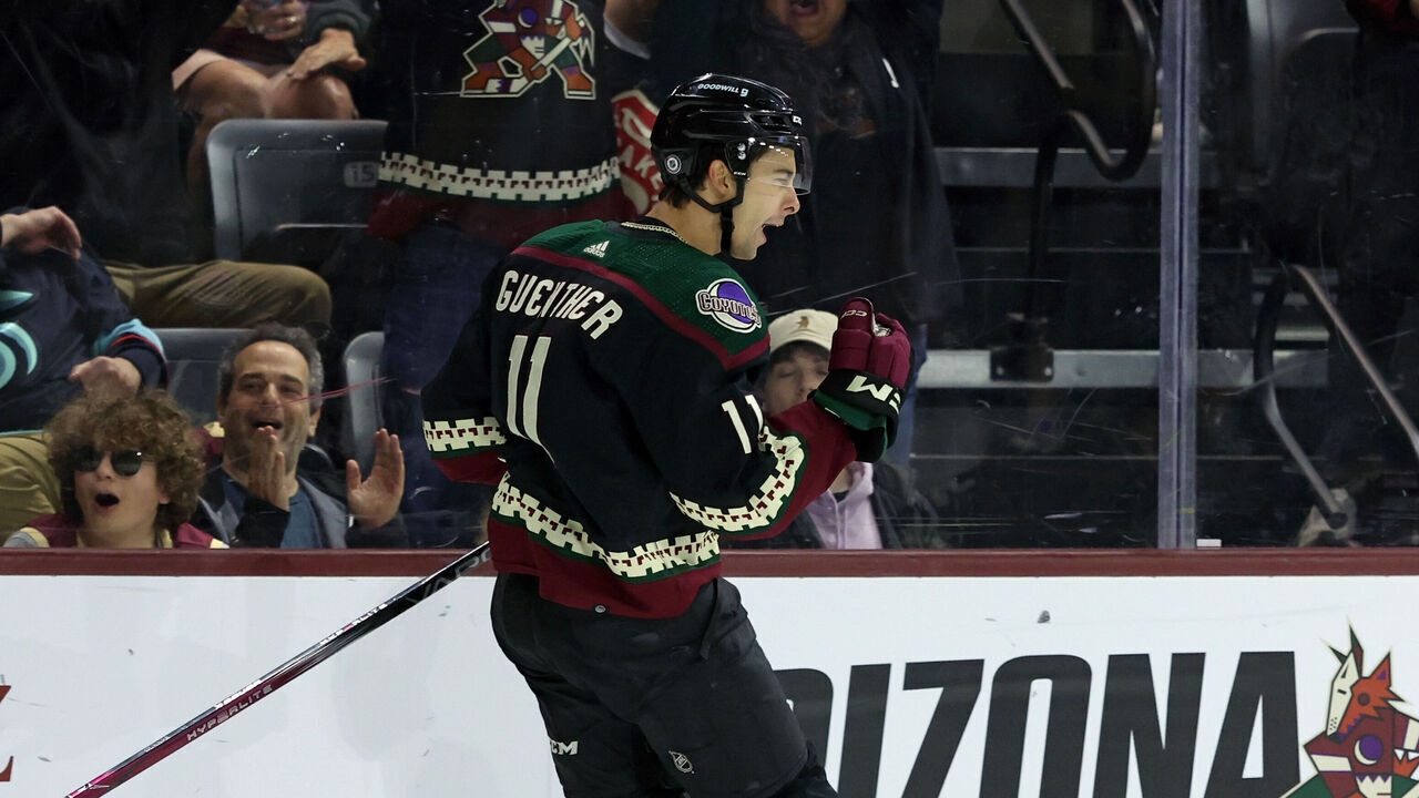 TEMPE, ARIZONA - MARCH 22: Dylan Guenther #11 of the Arizona Coyotes celebrates his game winning overtime goal against the Seattle Kraken at Mullett Arena on March 22, 2024 in Tempe, Arizona.
