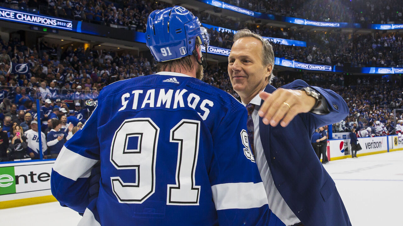TAMPA, FL - JUNE 11: Steven Stamkos #91 and head coach Jon Cooper of the Tampa Bay Lightning celebrate the series win against the New York Rangers after Game Six of the Eastern Conference Final of the 2022 Stanley Cup Playoffs at Amalie Arena on June 11, 2022 in Tampa, Florida.