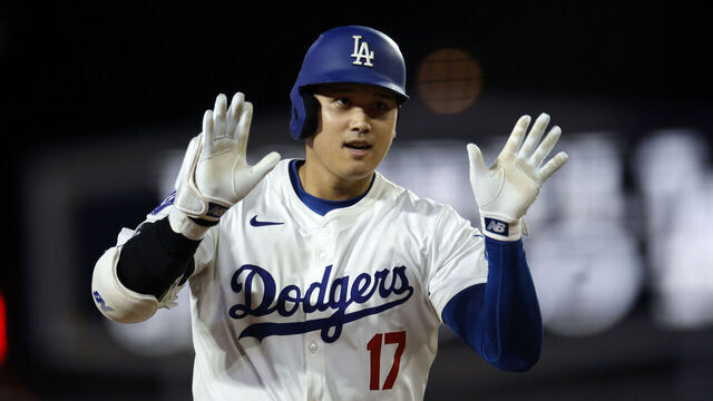 LOS ANGELES, CALIFORNIA - SEPTEMBER 20: Designated hitter Shohei Ohtani #17 of the Los Angeles Dodgers celebrates as he runs the bases after hitting his 52nd career home run against starting pitcher Kyle Freeland #21 of the Colorado Rockies during the fifth inning at Dodger Stadium on September 20, 2024 in Los Angeles, California.