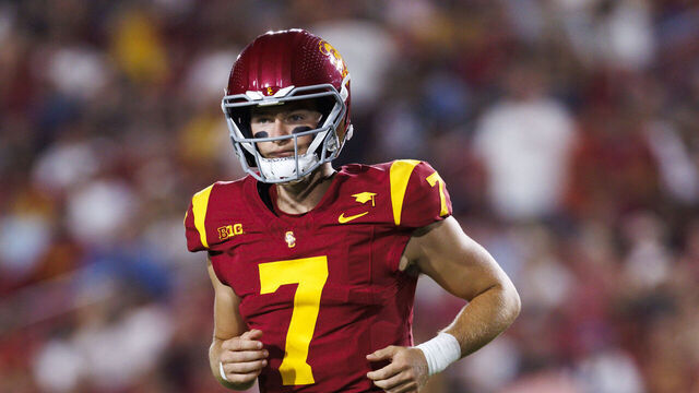 LOS ANGELES, CALIFORNIA - SEPTEMBER 7: Miller Moss #7 of the USC Trojans walks off the field during a game against Utah State Aggies at United Airlines Field at the Los Angeles Memorial Coliseum on September 7, 2024 in Los Angeles, California.