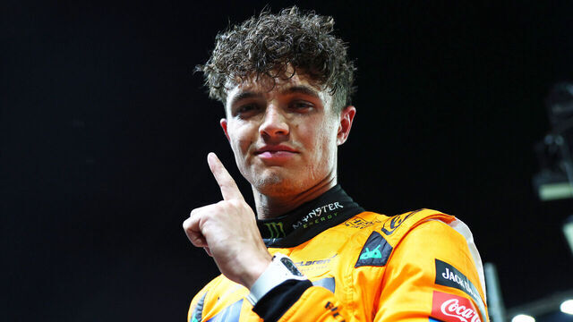 SINGAPORE, SINGAPORE - SEPTEMBER 21: Pole position qualifier Lando Norris of Great Britain and McLaren celebrates in parc ferme during qualifying ahead of the F1 Grand Prix of Singapore at Marina Bay Street Circuit on September 21, 2024 in Singapore, Singapore.
