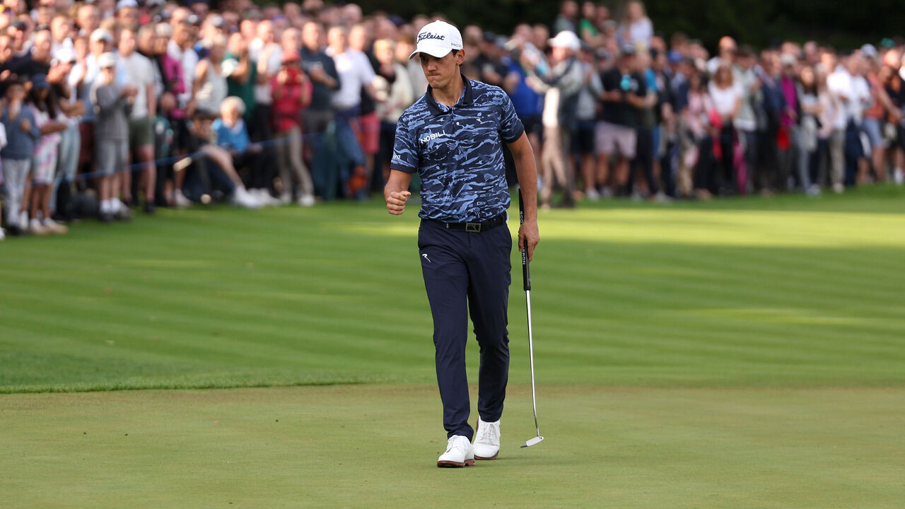 VIRGINIA WATER, ENGLAND - SEPTEMBER 21: Matteo Manassero of Italy celebrates a birdie putt on the 18th green during day three of the BMW PGA Championship 2024 at Wentworth Club on September 21, 2024 in Virginia Water, England.