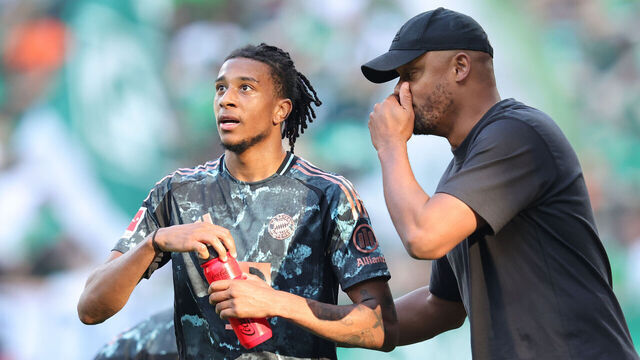 BREMEN, GERMANY - SEPTEMBER 21: (LRL) Michael Olise of FC Bayern München and Trainer Head coach Vincent Kompany of FC Bayern during the Bundesliga match between SV Werder Bremen and FC Bayern München at Weserstadion on September 21, 2024 in Bremen, Germany.