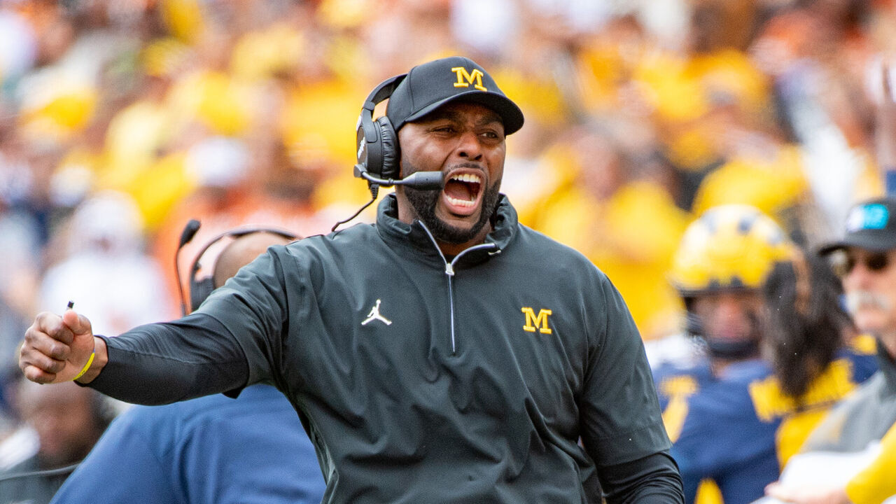 ANN ARBOR, MICHIGAN - SEPTEMBER 07: Head Football Coach Sherrone Moore of the Michigan Wolverines reacts after a play during the first half of a college football game against the Texas Longhorns at Michigan Stadium on September 07, 2024 in Ann Arbor, Michigan.