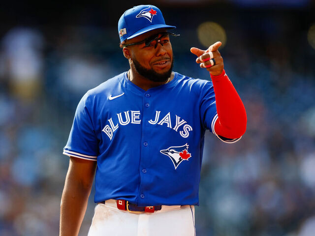 TORONTO, CANADA - SEPTEMBER 11: Vladimir Guerrero Jr. #27 of the Toronto Blue Jays gestures in the sixth inning during a game against the New York Mets at Rogers Centre on September 11, 2024 in Toronto, Canada.