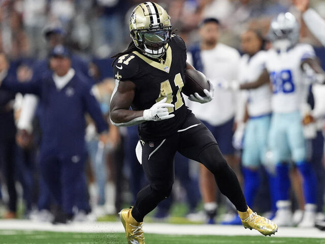 ARLINGTON, TEXAS - SEPTEMBER 15: Alvin Kamara #41 of the New Orleans Saints runs with the ball during the first half against the Dallas Cowboys at AT&T Stadium on September 15, 2024 in Arlington, Texas.