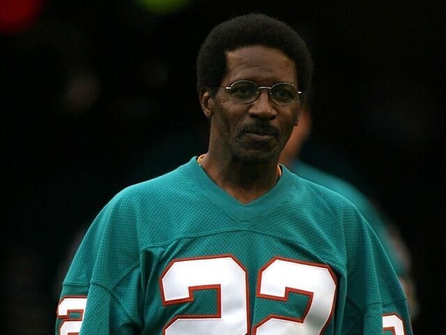MIAMI - DECEMBER 16: Hall of Fame football player Mercury Morris walks out for a ceremony for the 1972 undefeated Miami Dolphins during half time against the Baltimore Ravens December 16, 2007 at Joe Robbie Stadium in Miami, Florida. The Dolphins defeated the Ravens 22-16.