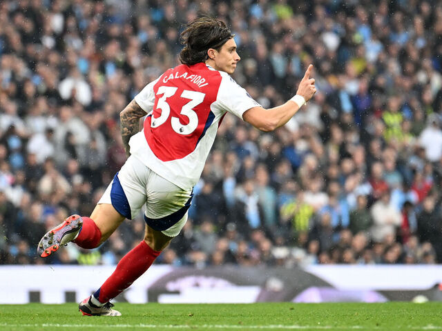 MANCHESTER, ENGLAND - SEPTEMBER 22: Riccardo Calafiori of Arsenal celebrates scoring his team's first goal during the Premier League match between Manchester City FC and Arsenal FC at Etihad Stadium on September 22, 2024 in Manchester, England.