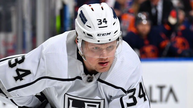 EDMONTON, CANADA - MARCH 28: Arthur Kaliyev #34 of the Los Angeles Kings awaits a face-off during the game against the Edmonton Oilers at Rogers Place on March 28, 2024, in Edmonton, Alberta, Canada.