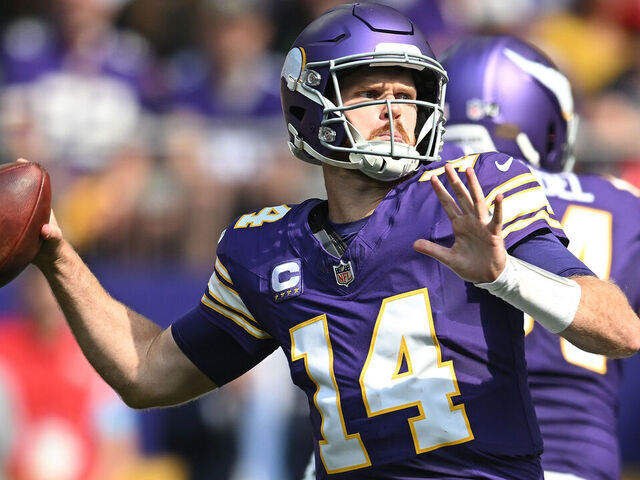 MINNEAPOLIS, MINNESOTA - SEPTEMBER 22: Quarterback Sam Darnold #14 of the Minnesota Vikings passes the ball against the Houston Texans during the second quarter at U.S. Bank Stadium on September 22, 2024 in Minneapolis, Minnesota.