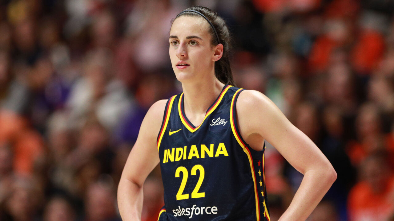 UNCASVILLE, CT - SEPTEMBER 22: Caitlin Clark #22 of the Indiana Fever looks on during the game against the Connecticut Sun during round one game one of the 2024 WNBA Playoffs on September 22, 2024 at the Mohegan Sun Arena in Uncasville, Connecticut. Mandatory Copyright Notice: Copyright 2024 NBAE