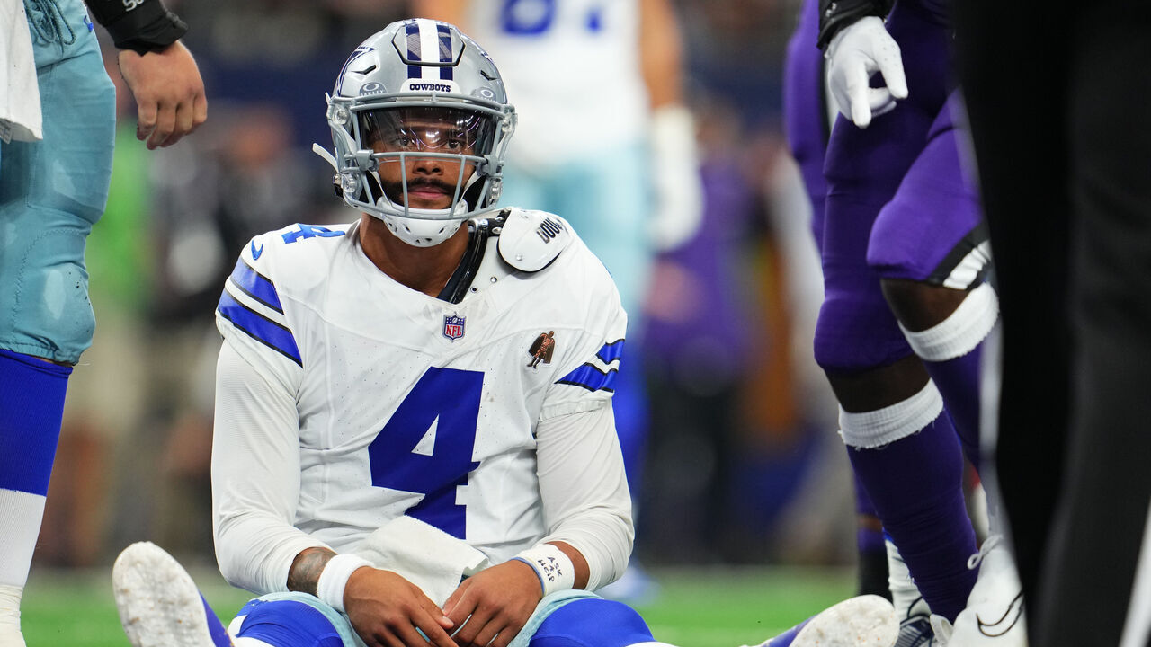 ARLINGTON, TX - SEPTEMBER 22: Dak Prescott #4 of the Dallas Cowboys looks on after a play against the Baltimore Ravens during the first half of an NFL football game at AT&T Stadium on September 22, 2024 in Arlington, Texas.
