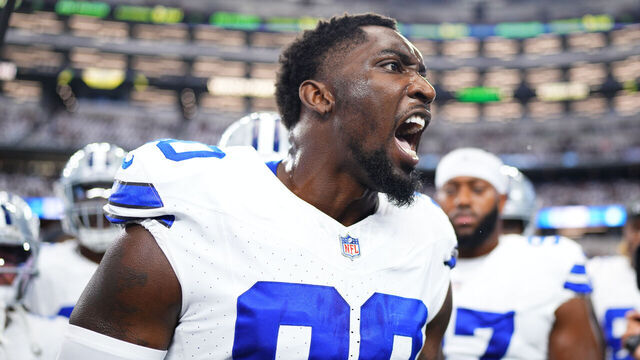 ARLINGTON, TX - SEPTEMBER 22: DeMarcus Lawrence #90 of the Dallas Cowboys speaks to teammates before kickoff against the Baltimore Ravens during an NFL football game at AT&T Stadium on September 22, 2024 in Arlington, Texas.