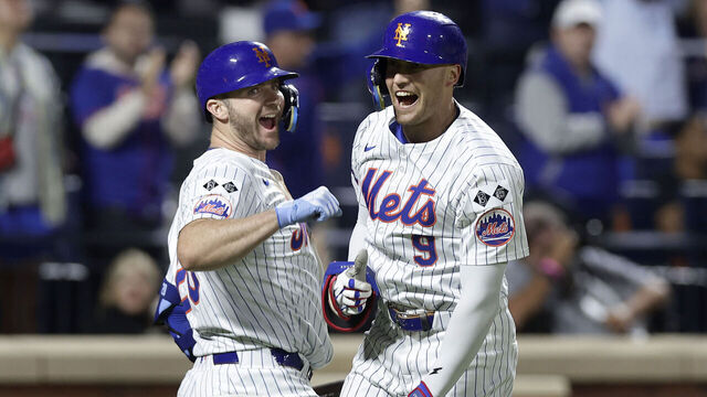 NEW YORK, NEW YORK - SEPTEMBER 22: Brandon Nimmo #9 of the New York Mets celebrates his sixth inning home run against the Philadelphia Phillies with teammate Pete Alonso #20 at Citi Field on September 22, 2024 in New York City.