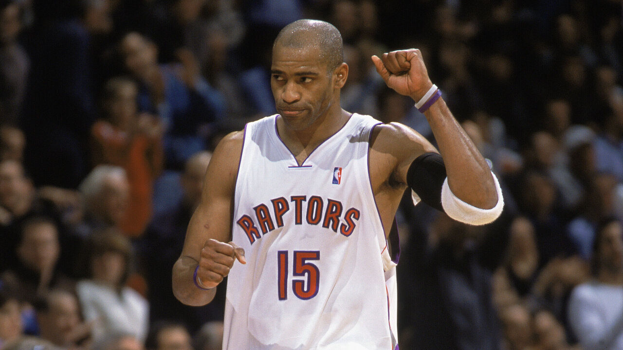 TORONTO, CANADA - DECEMBER 3: Vince Carter #15 of the Toronto Raptors celebrates during the NBA game against the Boston Celtics at Air Canada Centre on December 3, 2003 in Toronto, Canada. The Raptors won 105-95. NOTE TO USER: User expressly acknowledges and agrees that, by downloading and/or using this Photograph, User is consenting to the terms and conditions of the Getty Images License Agreement.