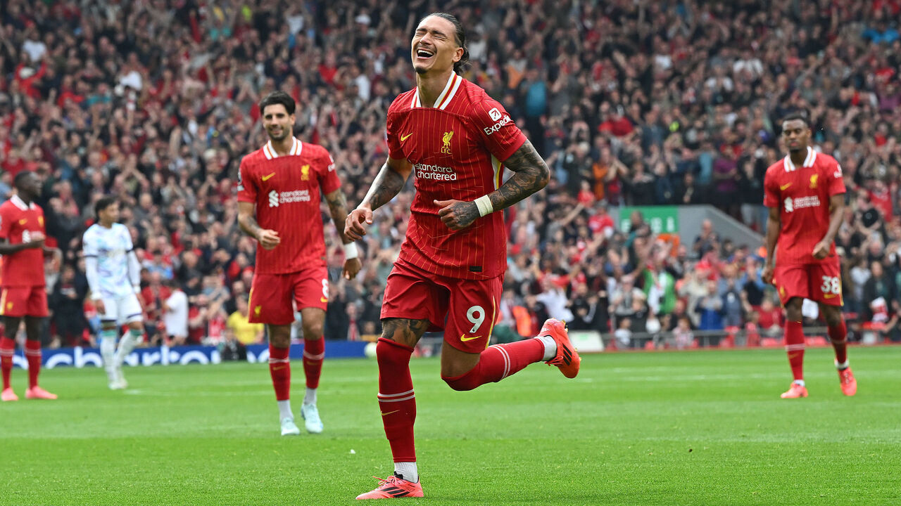 LIVERPOOL, ENGLAND - SEPTEMBER 21: (THE SUN OUT, THE SUN ON SUNDAY OUT) Darwin Nunez of Liverpool celebrating after scoring the third goal during the Premier League match between Liverpool FC and AFC Bournemouth at Anfield on September 21, 2024 in Liverpool, England.