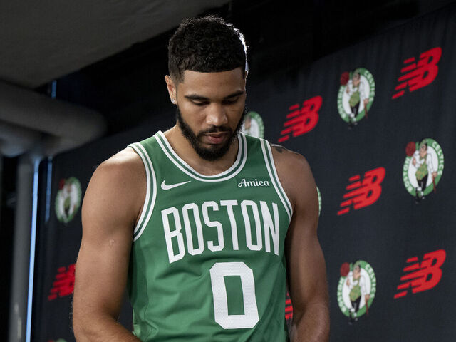 BOSTON, MASSACHUSETTS - SEPTEMBER 24: Jayson Tatum #0 of the Boston Celtics speaks to the media during Boston Celtics Media Day at The Auerbach Center on September 24, 2024 in Boston, Massachusetts.