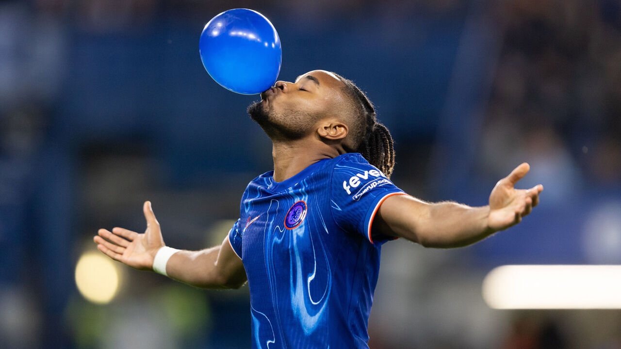 LONDON, ENGLAND - SEPTEMBER 24: Christopher Nkunku of Chelsea celebrates after scoring his side's fifth goal during the Carabao Cup Third Round match between Chelsea and Barrow at Stamford Bridge on September 24, 2024 in London, England.