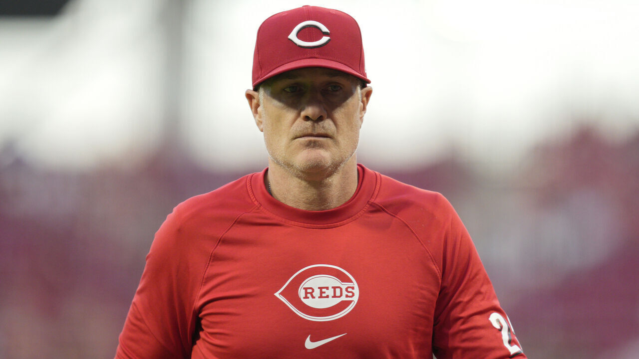 CINCINNATI, OHIO - JUNE 06: David Bell #25 of the Cincinnati Reds walks to the dugout during a baseball game against the Chicago Cubs at Great American Ball Park on June 06, 2024 in Cincinnati, Ohio.