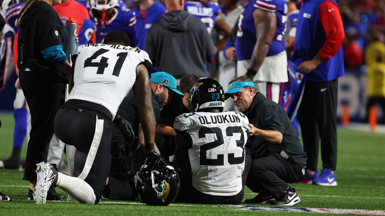 ORCHARD PARK, NEW YORK - SEPTEMBER 23: Foyesade Oluokun #23 of the Jacksonville Jaguars on the field with an injury during the second quarter against the Buffalo Bills at Highmark Stadium on September 23, 2024 in Orchard Park, New York.