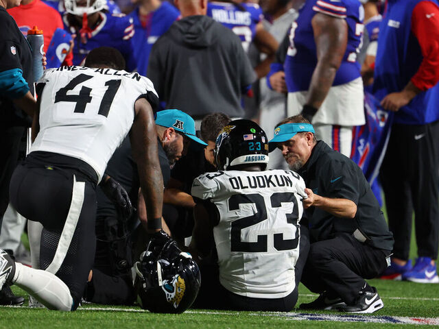 ORCHARD PARK, NEW YORK - SEPTEMBER 23: Foyesade Oluokun #23 of the Jacksonville Jaguars on the field with an injury during the second quarter against the Buffalo Bills at Highmark Stadium on September 23, 2024 in Orchard Park, New York.