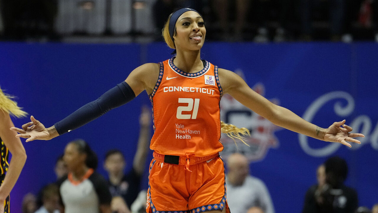 UNCASVILLE, CONNECTICUT - SEPTEMBER 22: DiJonai Carrington #21 of the Connecticut Sun celebrates after making a three-pointer against the Indiana Fever during the second half of a first round WNBA playoff game at Mohegan Sun Arena on September 22, 2024 in Uncasville, Connecticut. The Sun defeated the Fever 93-69.
