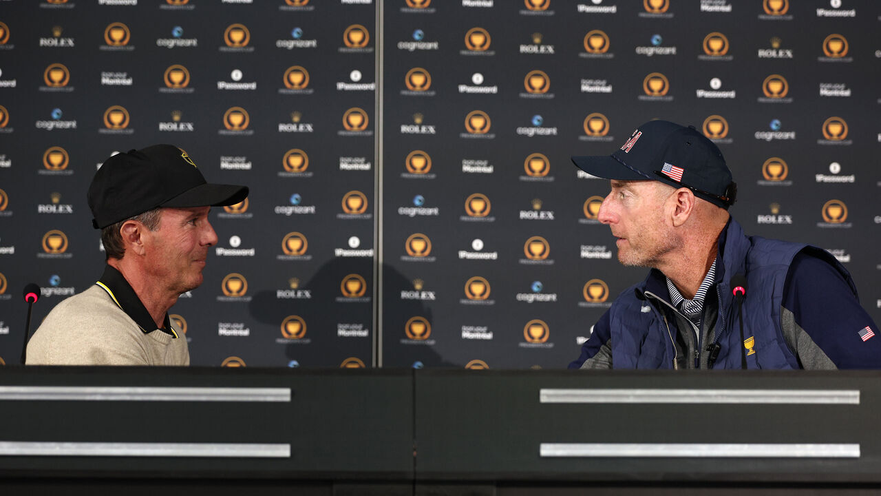 MONTREAL, QUEBEC - SEPTEMBER 24: International Team Captain Mike Weir shakes hands with U.S. Team Captain Jim Furyk during a press conference prior to the 2024 Presidents Cup at The Royal Montreal Golf Club on September 24, 2024 in Montreal, Quebec, Canada.