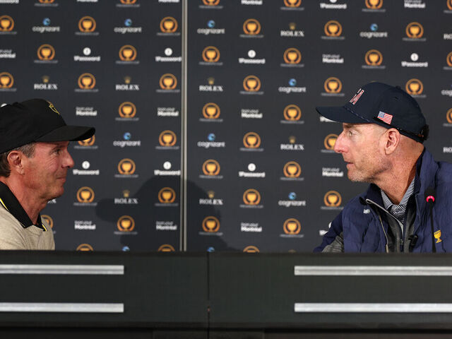 MONTREAL, QUEBEC - SEPTEMBER 24: International Team Captain Mike Weir shakes hands with U.S. Team Captain Jim Furyk during a press conference prior to the 2024 Presidents Cup at The Royal Montreal Golf Club on September 24, 2024 in Montreal, Quebec, Canada.