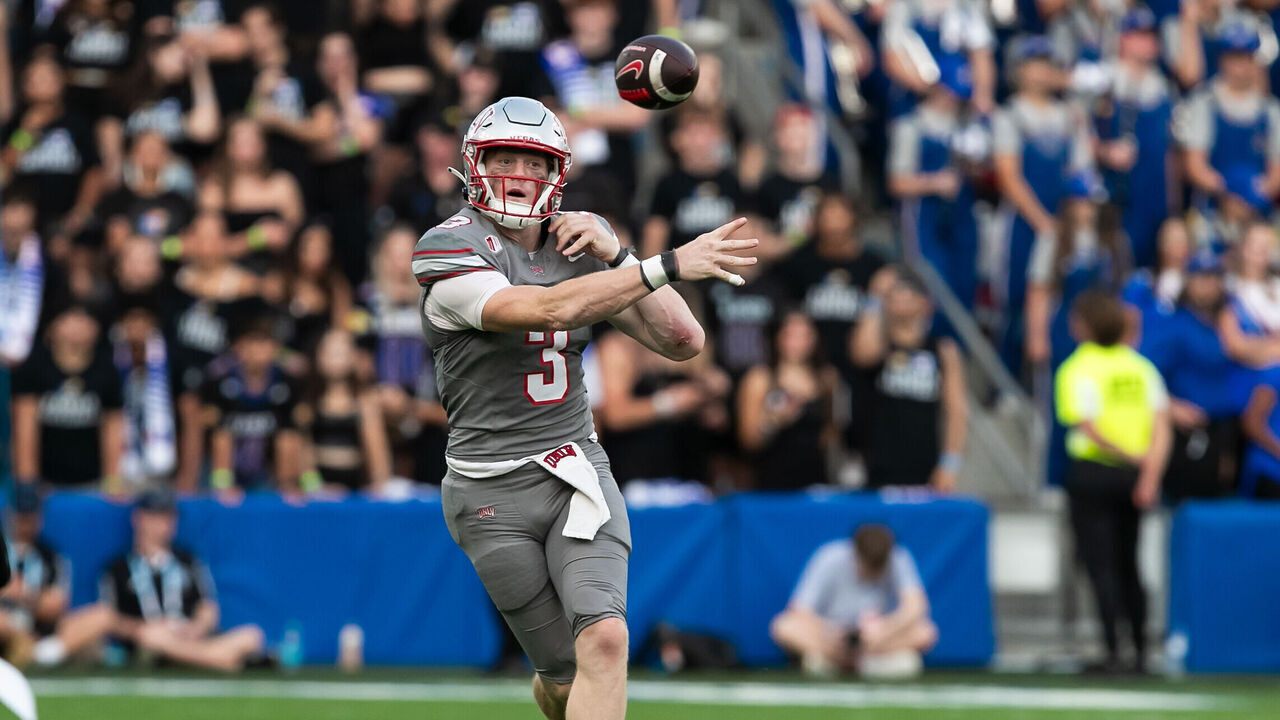 KANSAS CITY, KS - SEPTEMBER 13: UNLV quarterback Matthew Sluka (3) passes the ball during the game between the Kansas Jayhawks and the UNLV Rebels on Friday September 13, 2024 at Children's Mercy Park in Kansas City, Kansas.