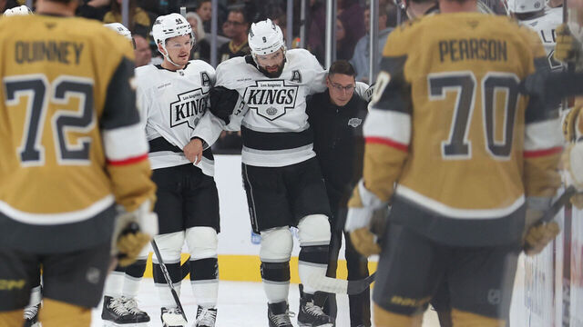 LAS VEGAS, NEVADA - SEPTEMBER 25: Drew Doughty #8 of the Los Angeles Kings reacts after suffering an injury during the first period against the Vegas Golden Knights at T-Mobile Arena on September 25, 2024 in Las Vegas, Nevada.
